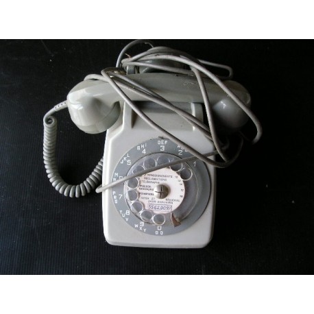Téléphone ancien gris à cadran