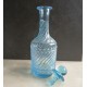 Flacon bleu en verre moulé 19cm